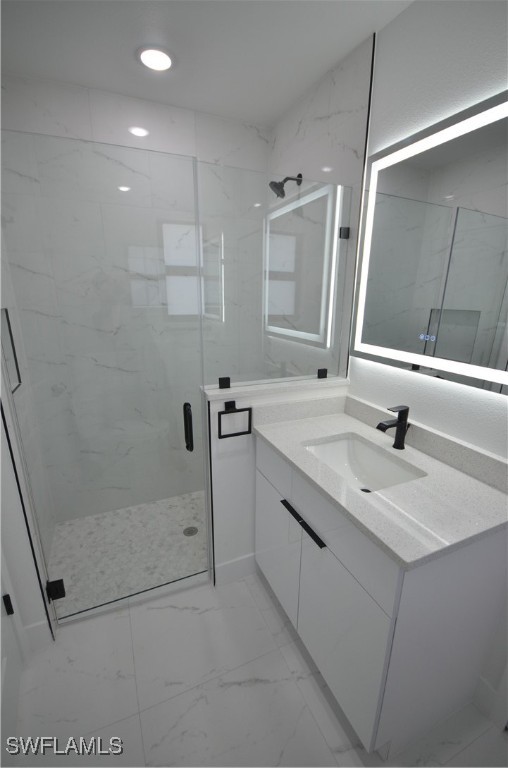 2132 Barker Boulevard Fort Myers, FL 33916 - Photo 24 of 36 a bathroom with a sink a toilet a mirror and shower