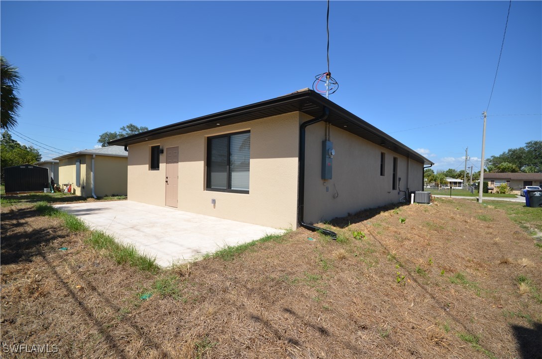 2132 Barker Boulevard Fort Myers, FL 33916 - Photo 32 of 36 a house view with a backyard space