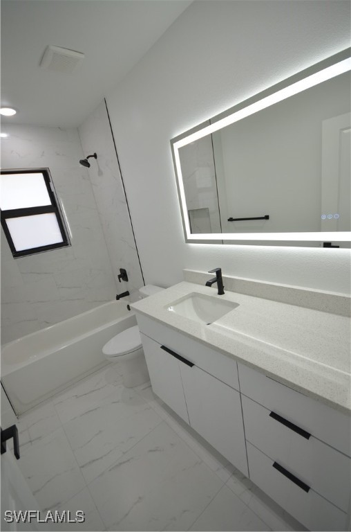 2132 Barker Boulevard Fort Myers, FL 33916 - Photo 10 of 36 a bathroom with a sink a toilet and bathtub