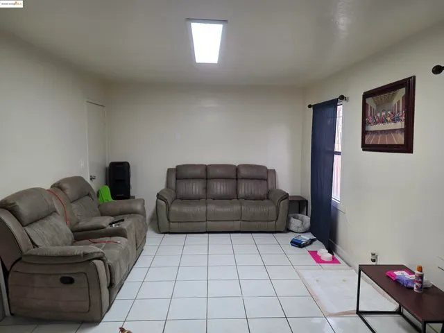 a kitchen with stainless steel appliances kitchen island granite countertop a sink and cabinets