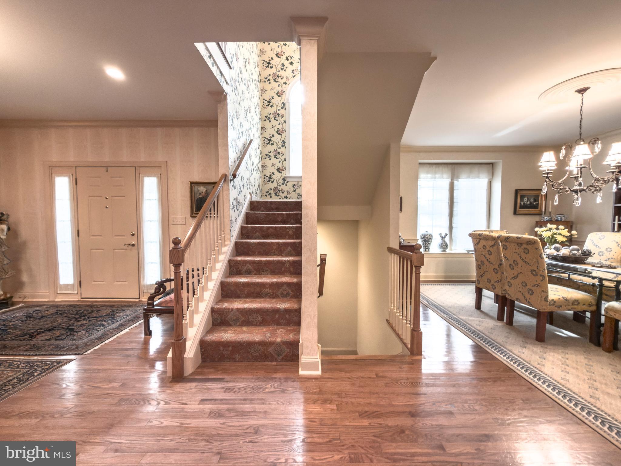 12 Chalous Lane Villanova, PA 19085 - Photo 11 of 39 a view of a livingroom with furniture stairs and wooden floor