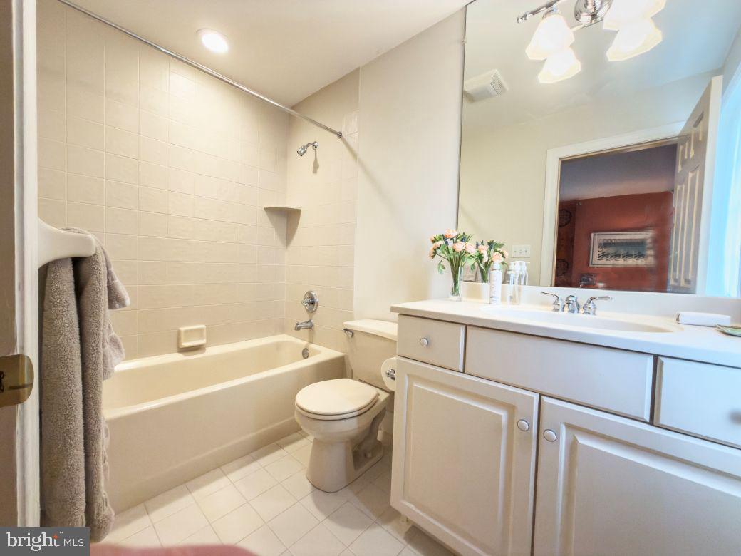12 Chalous Lane Villanova, PA 19085 - Photo 25 of 39 a bathroom with a sink a toilet and bathtub