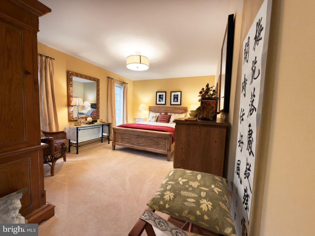 12 Chalous Lane Villanova, PA 19085 - Photo 26 of 39 a bedroom with furniture and a large window