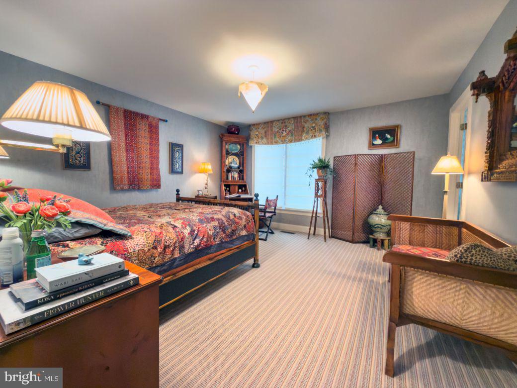 12 Chalous Lane Villanova, PA 19085 - Photo 29 of 39 a bedroom with bed and a dresser