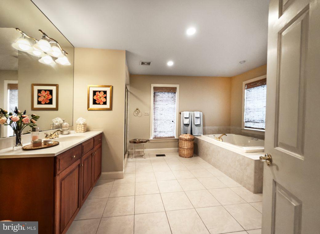 12 Chalous Lane Villanova, PA 19085 - Photo 37 of 39 a large white kitchen with a large window