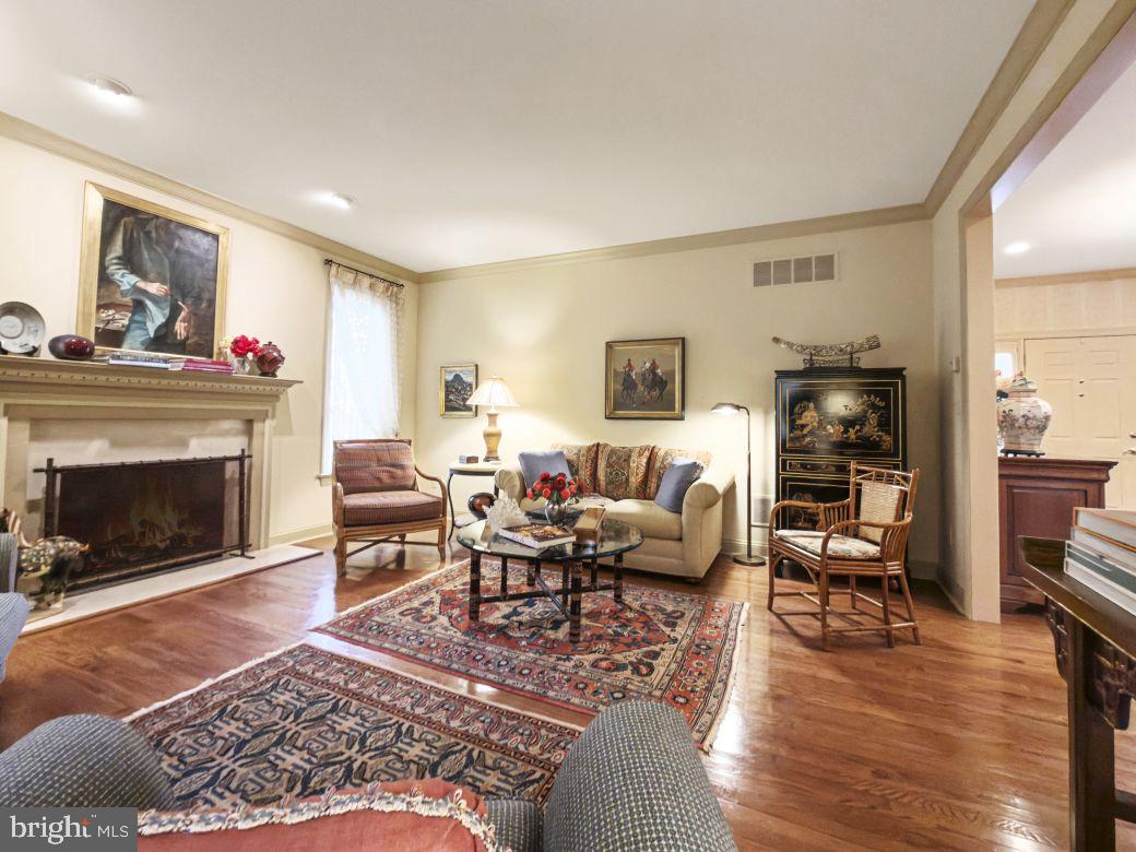 12 Chalous Lane Villanova, PA 19085 - Photo 8 of 39 a living room with furniture and a fireplace