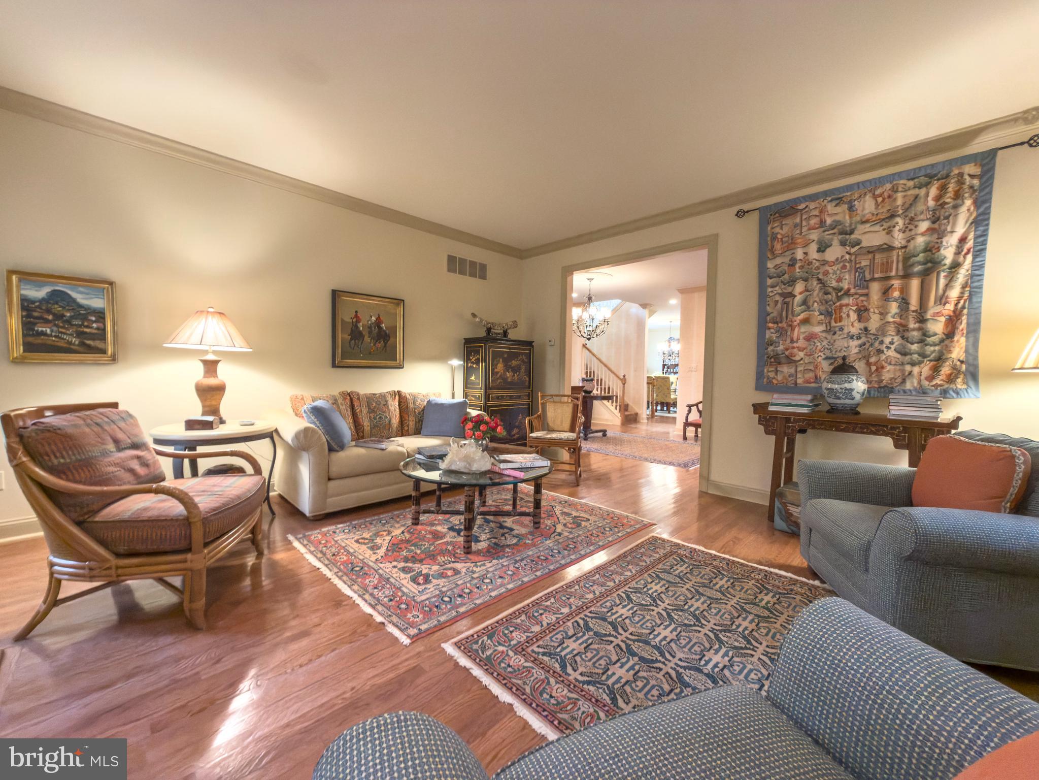 12 Chalous Lane Villanova, PA 19085 - Photo 9 of 39 a living room with furniture a rug and a large window