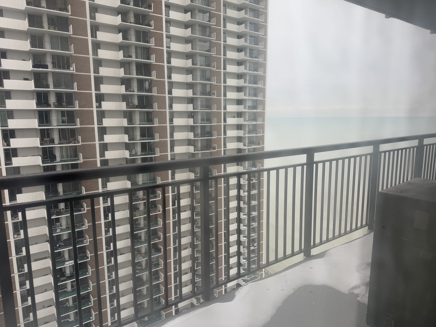 6007 North Sheridan Road, Unit 20H Chicago, IL 60660 - Photo 11 of 13 a view of a balcony with a window