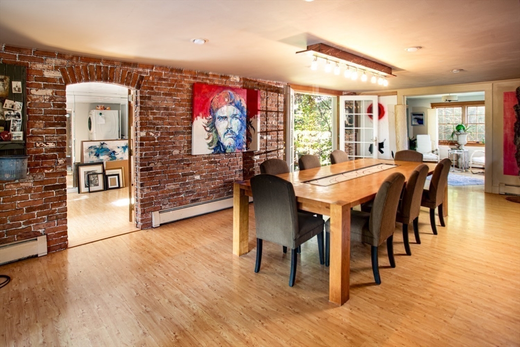 17 Quail Trail Westport, MA 02790 - Photo 19 of 40 a dining room with furniture and wooden floor