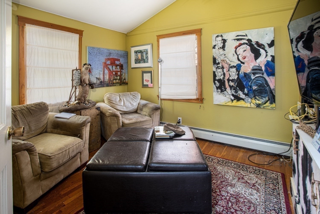 17 Quail Trail Westport, MA 02790 - Photo 25 of 40 a living room with furniture and a window