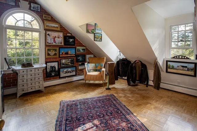 a living room with couch and a flat screen tv