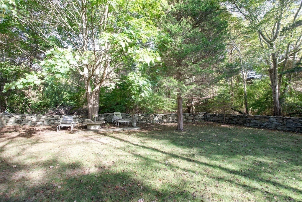 17 Quail Trail Westport, MA 02790 - Photo 35 of 40 a view of a tree with a yard