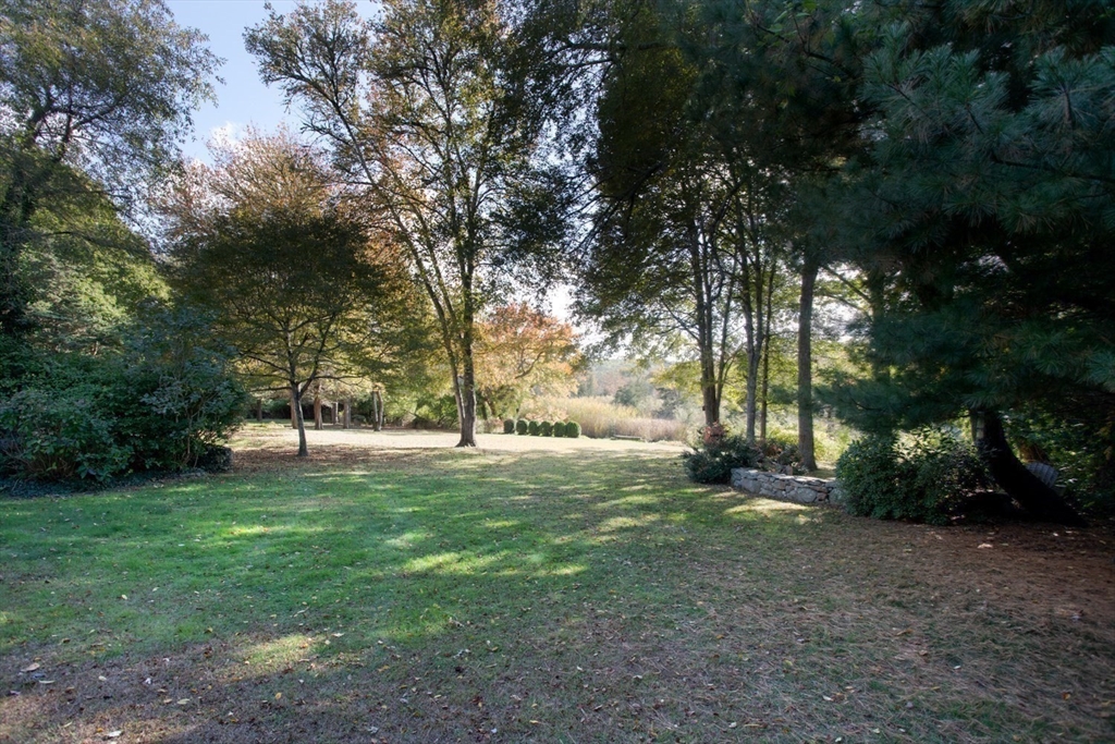 17 Quail Trail Westport, MA 02790 - Photo 38 of 40 a view of a yard with a tree