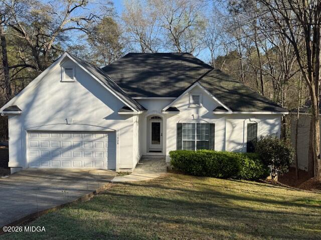 135 Chadwick Trail Macon, GA 31210 - Photo 1 of 22 a view of a house with a yard