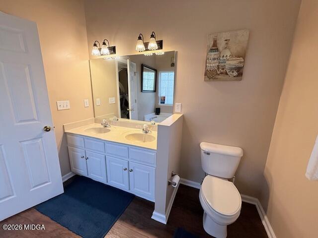 135 Chadwick Trail Macon, GA 31210 - Photo 12 of 22 a bathroom with a toilet sink and mirror