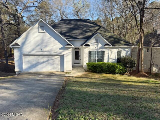 135 Chadwick Trail Macon, GA 31210 - Photo 22 of 22 a front view of a house with a yard