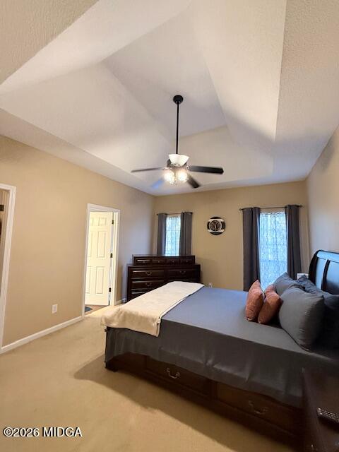 135 Chadwick Trail Macon, GA 31210 - Photo 8 of 22 a bedroom with a large bed and a chandelier