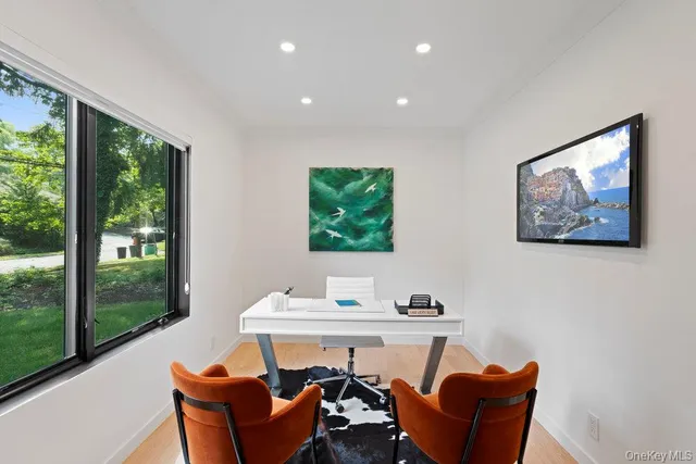 a outdoor dining space with furniture and window