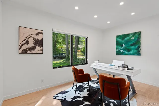 a workspace with furniture and window