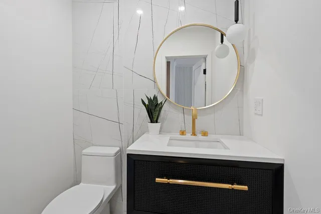 a bedroom with a large bed and a large window