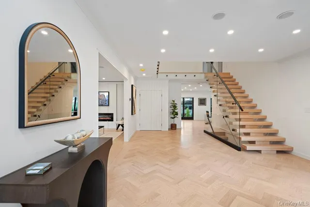 a view of a kitchen with furniture and staircase
