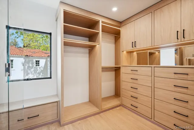 a view of an empty walk in closet