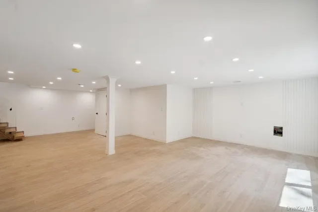 a utility room with sink dryer and washer