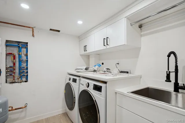 a view of a patio with couches and a fire pit