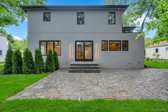 a picture of a bench in front of a window