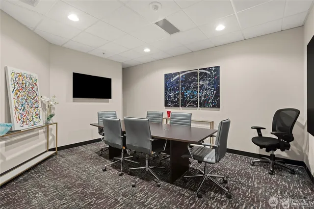 a view of a workspace with furniture