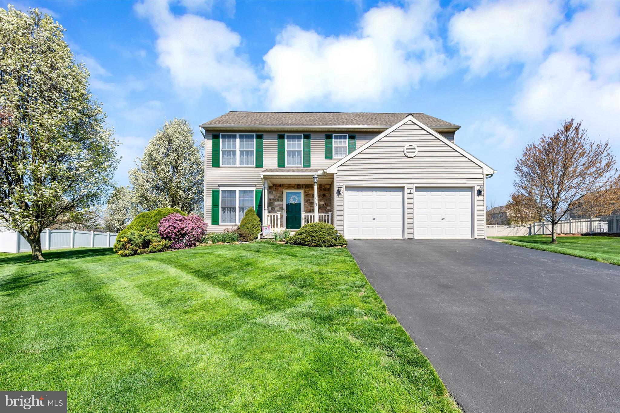 113 Hillcrest Road Marietta, PA 17547 - Photo 2 of 29 a front view of a house with a garden