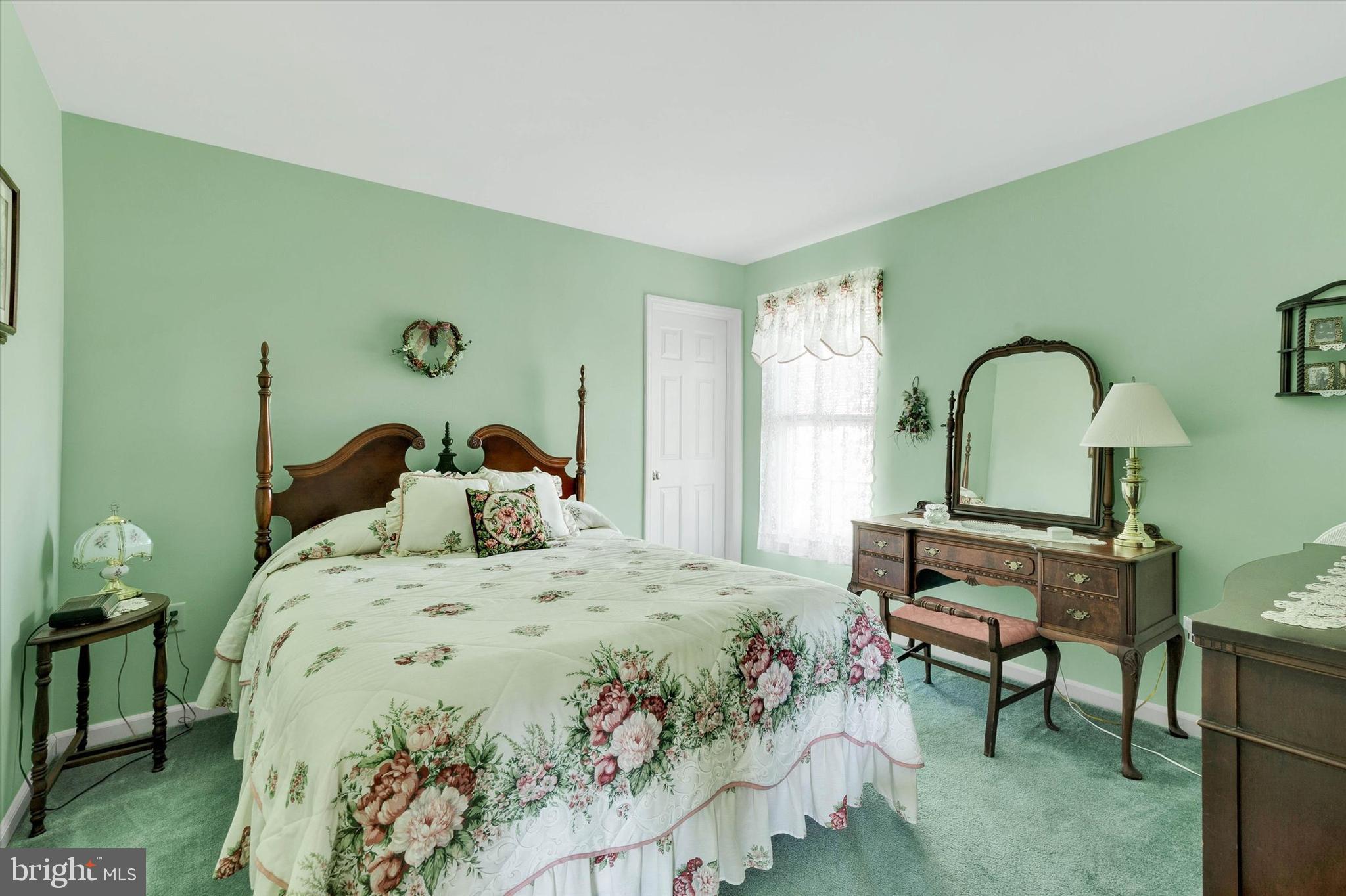113 Hillcrest Road Marietta, PA 17547 - Photo 23 of 29 a bedroom with a bed and a dresser next to a window
