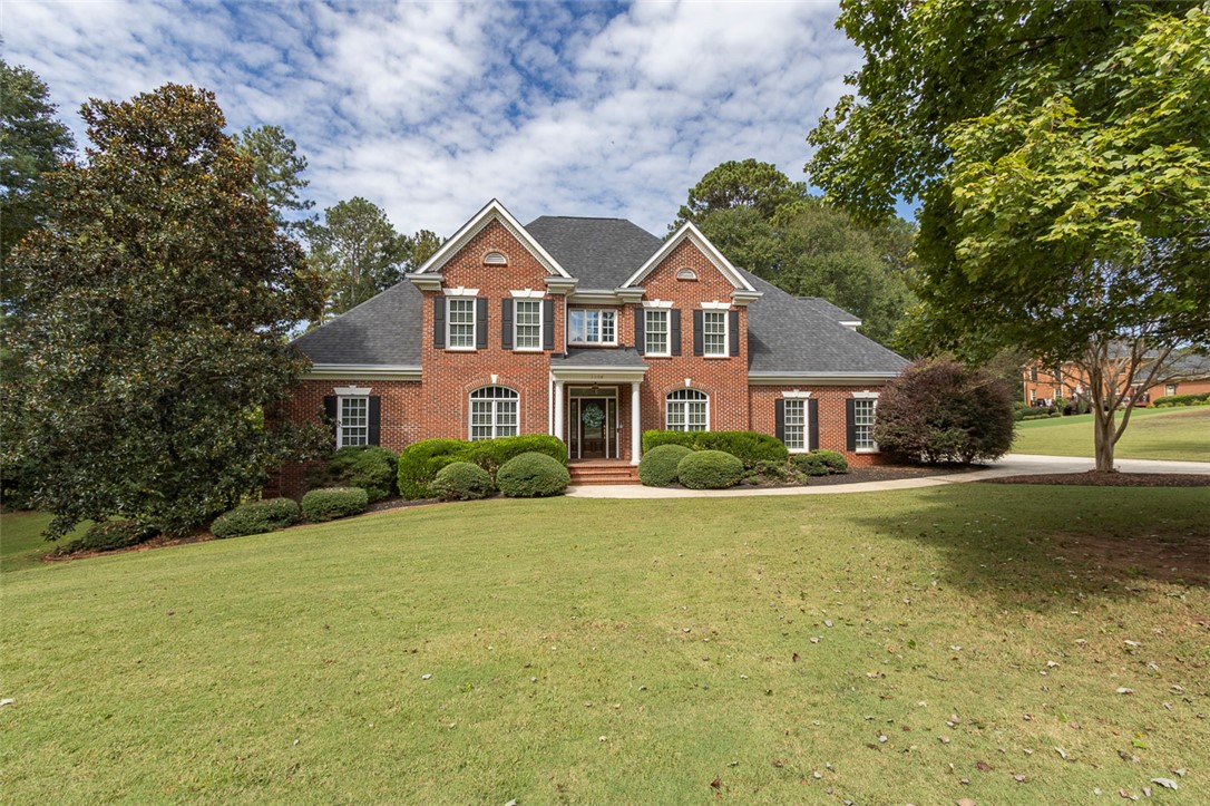 1104 Harpers Way Anderson, SC 29621 - Photo 1 of 50 This classic brick residence features a lush lawn and manicured landscaping.
