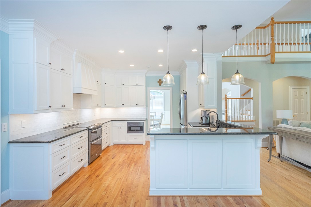 1104 Harpers Way Anderson, SC 29621 - Photo 11 of 50 Bright and open kitchen with modern amenities and seamless flow into living areas.