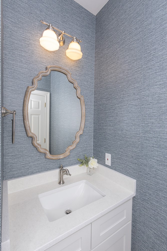 1104 Harpers Way Anderson, SC 29621 - Photo 14 of 50 This bathroom features a sleek vanity and a stylish mirror, creating a fresh, inviting atmosphere.