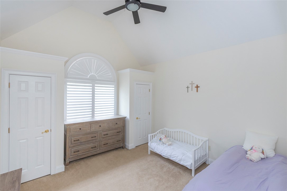 1104 Harpers Way Anderson, SC 29621 - Photo 28 of 50 This airy bedroom features vaulted ceilings and ample natural light, creating a serene personal retreat.