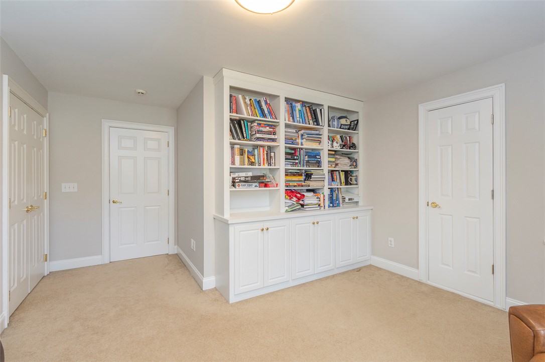 1104 Harpers Way Anderson, SC 29621 - Photo 30 of 50 This versatile room features custom built-in shelving, perfect for a library or home office.
