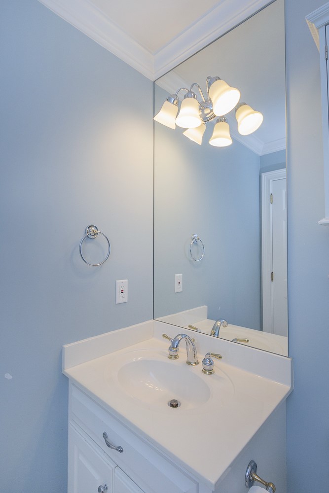 1104 Harpers Way Anderson, SC 29621 - Photo 32 of 50 This functional bathroom features a classic vanity with a large mirror.