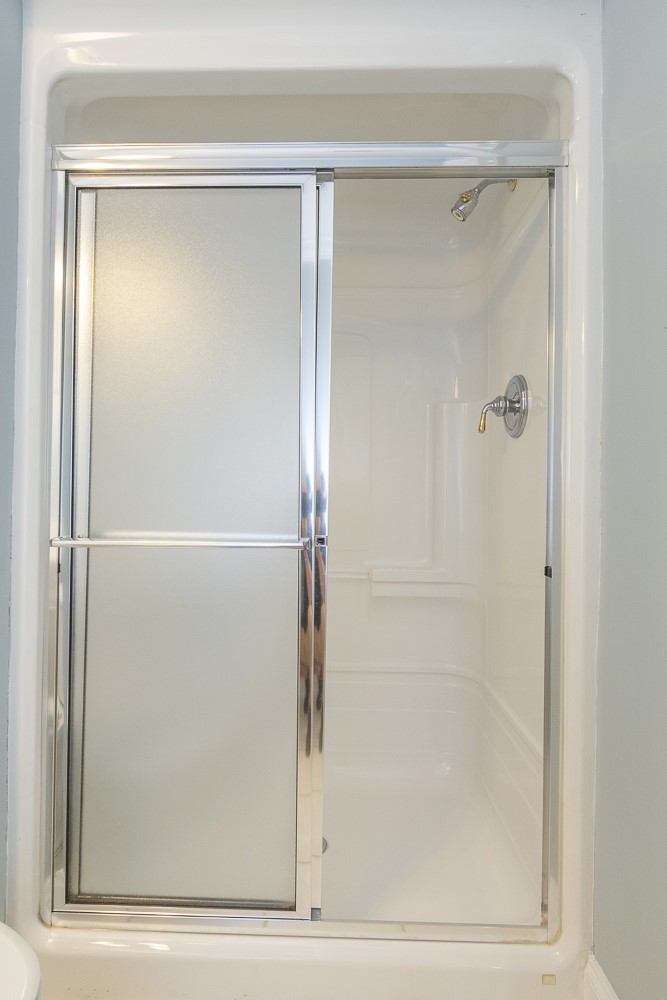 1104 Harpers Way Anderson, SC 29621 - Photo 33 of 50 Clean and functional shower enclosure, ready for daily refreshment.