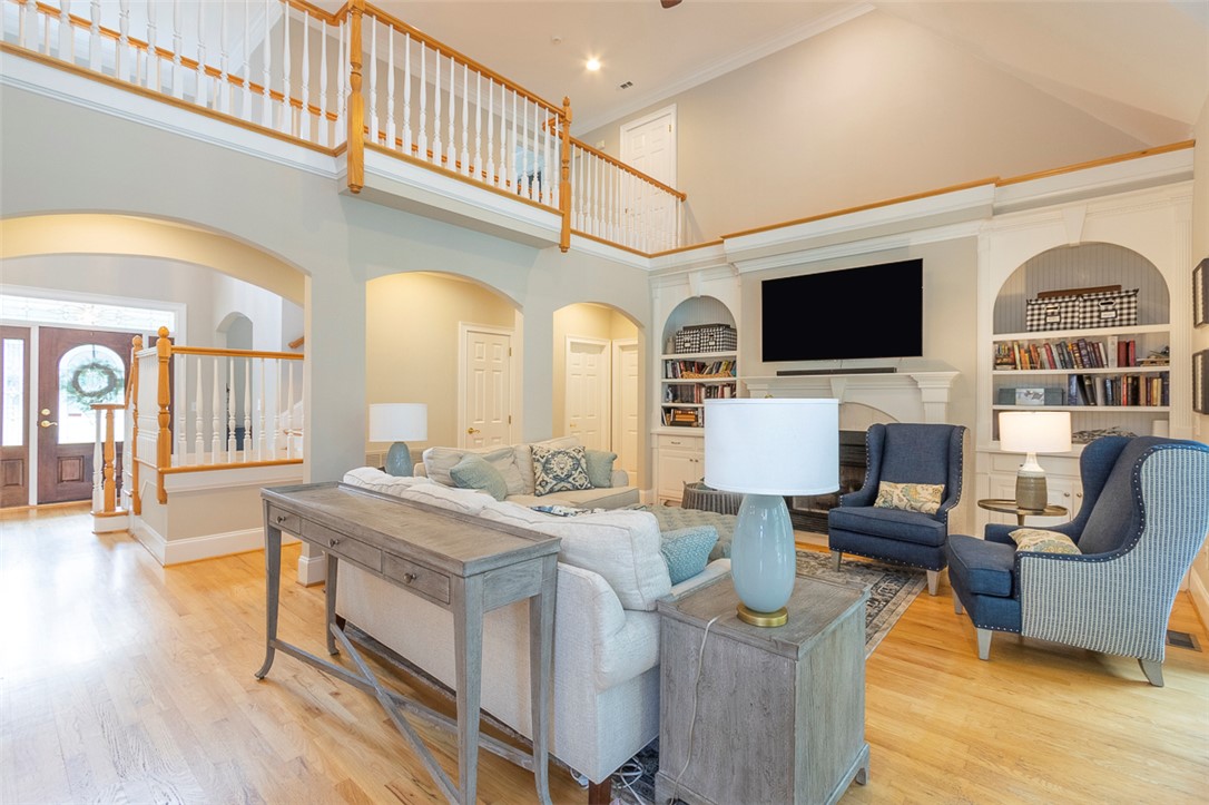 1104 Harpers Way Anderson, SC 29621 - Photo 50 of 50 Bright and airy living room with a spacious open floorplan and built-in shelving.