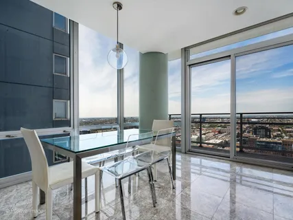 a living room with fireplace furniture and a flat screen tv