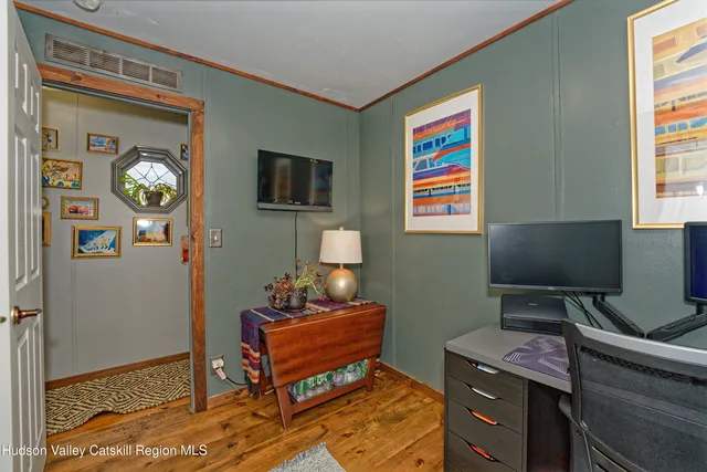 a room with furniture and a window