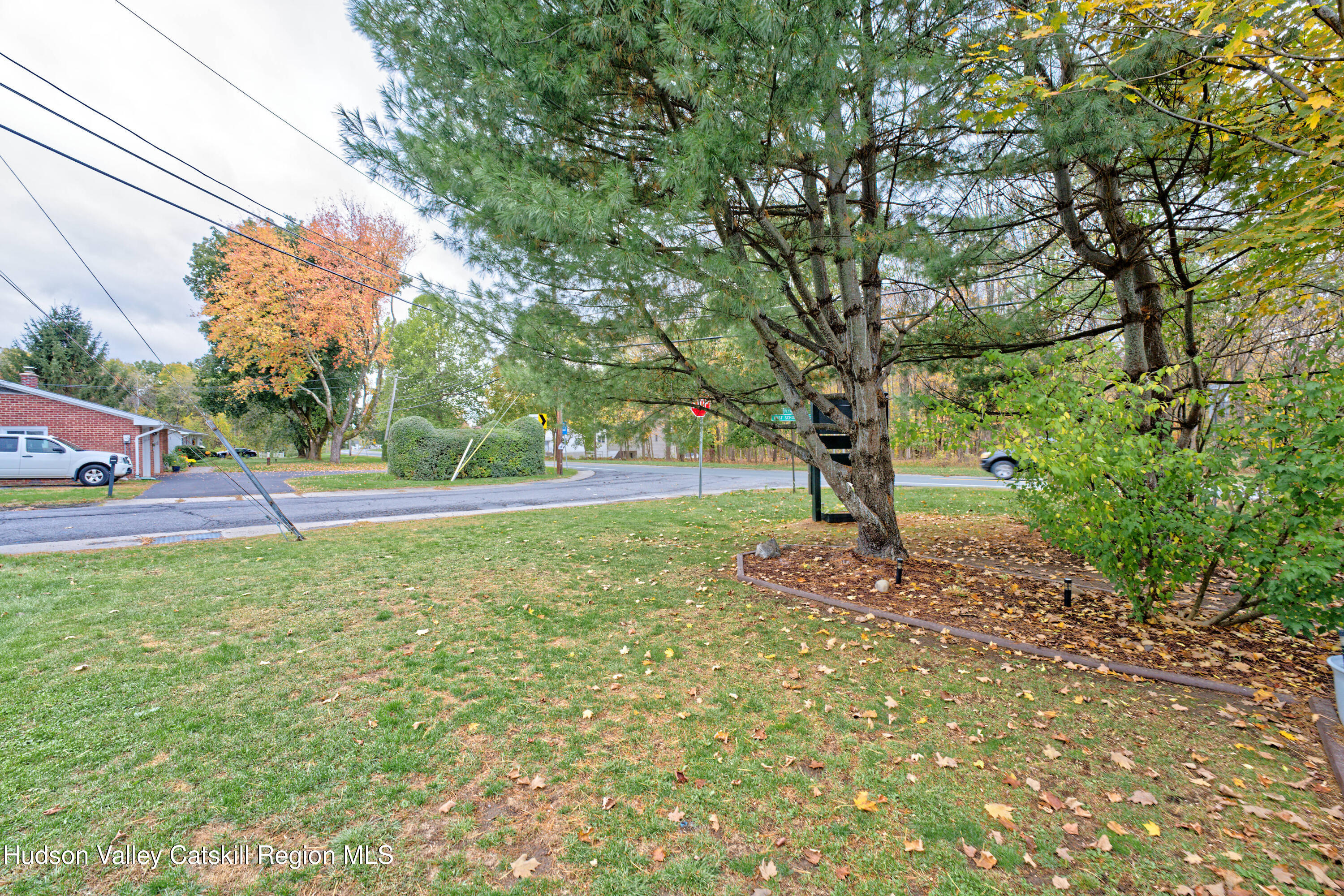 28 Matthew Drive, Unit 28 Castleton-on-Hudson, NY 12033 - Photo 23 of 28 a tree in the middle of a yard