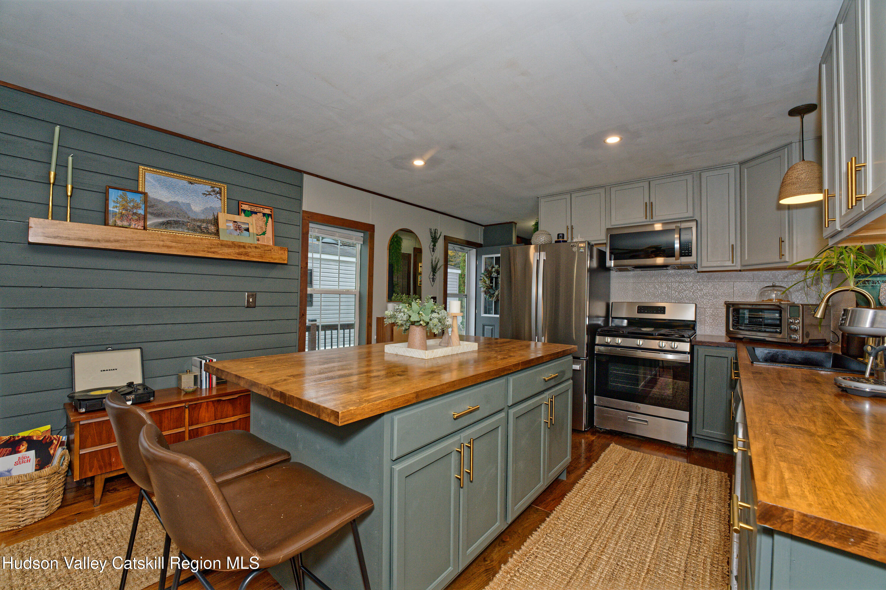 28 Matthew Drive, Unit 28 Castleton-on-Hudson, NY 12033 - Photo 4 of 28 a kitchen with stainless steel appliances granite countertop a stove top oven a sink and dishwasher