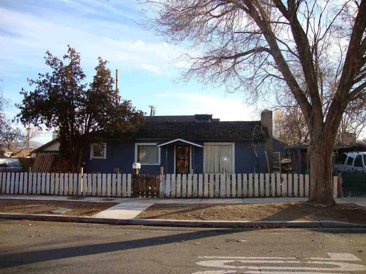1533 H Street Sparks, NV 89431 - Photo 1 of 1 a view of a house with a small yard and wooden fence