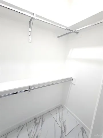 a view of small space with racks on the wall