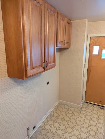 a view of room with cabinets