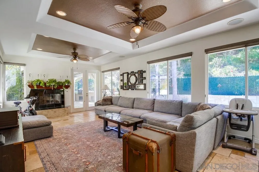 2305 Falkirk Row La Jolla, CA 92037 - Photo 19 of 36 a living room with furniture and a large window