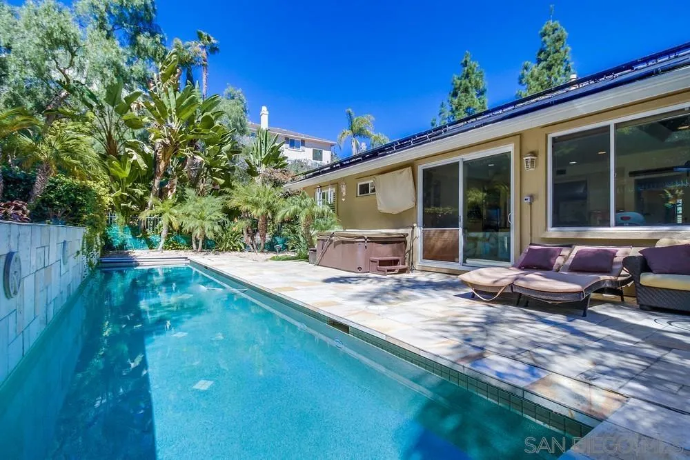 2305 Falkirk Row La Jolla, CA 92037 - Photo 25 of 36 a view of a house with backyard sitting area and garden