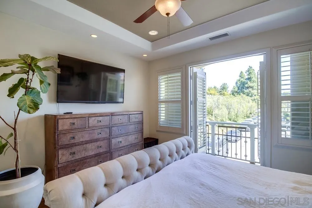 2305 Falkirk Row La Jolla, CA 92037 - Photo 31 of 36 a living room with furniture and a flat screen tv
